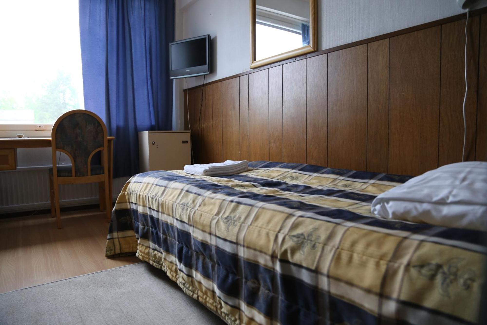 Hotelli Iisalmen Seurahuone Iisalmi Szoba fotó